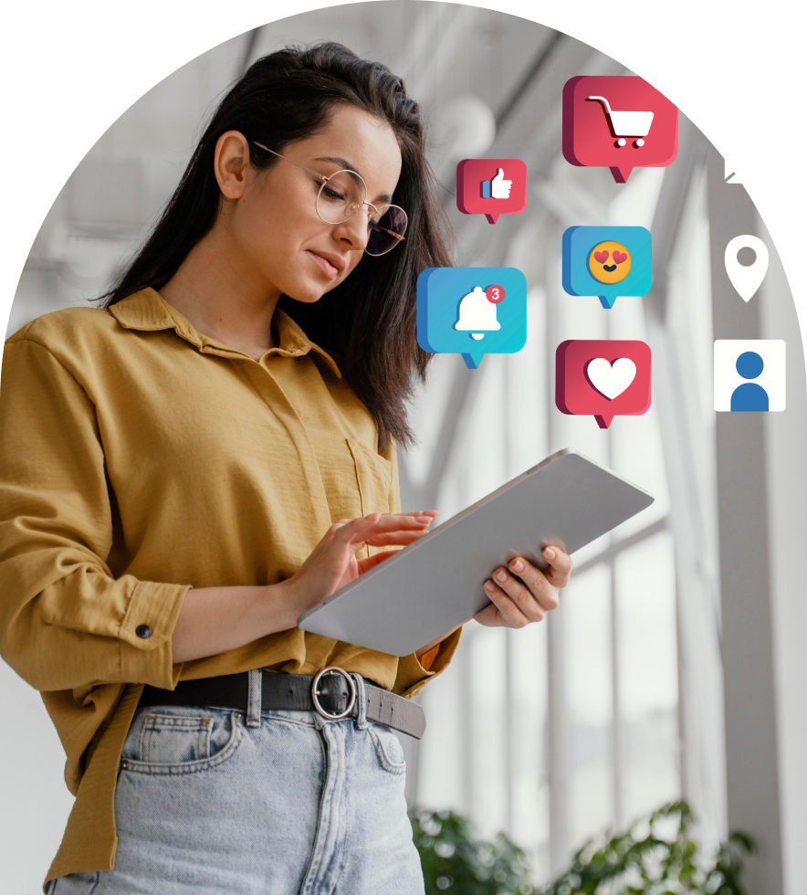 Woman using tablet with social media icons.